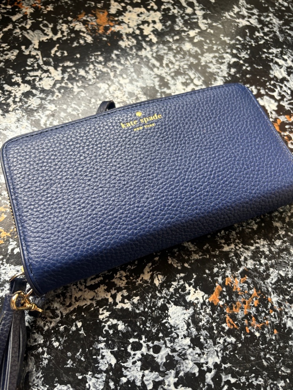 kate spade navy pebbled leather zip wristlet with gold logo